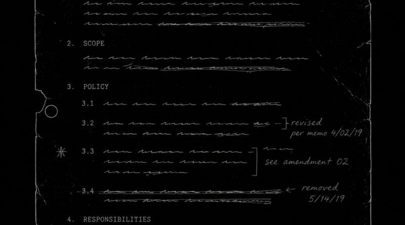 A revised policy document with layered edits, representing institutional drift and semantic degradation.